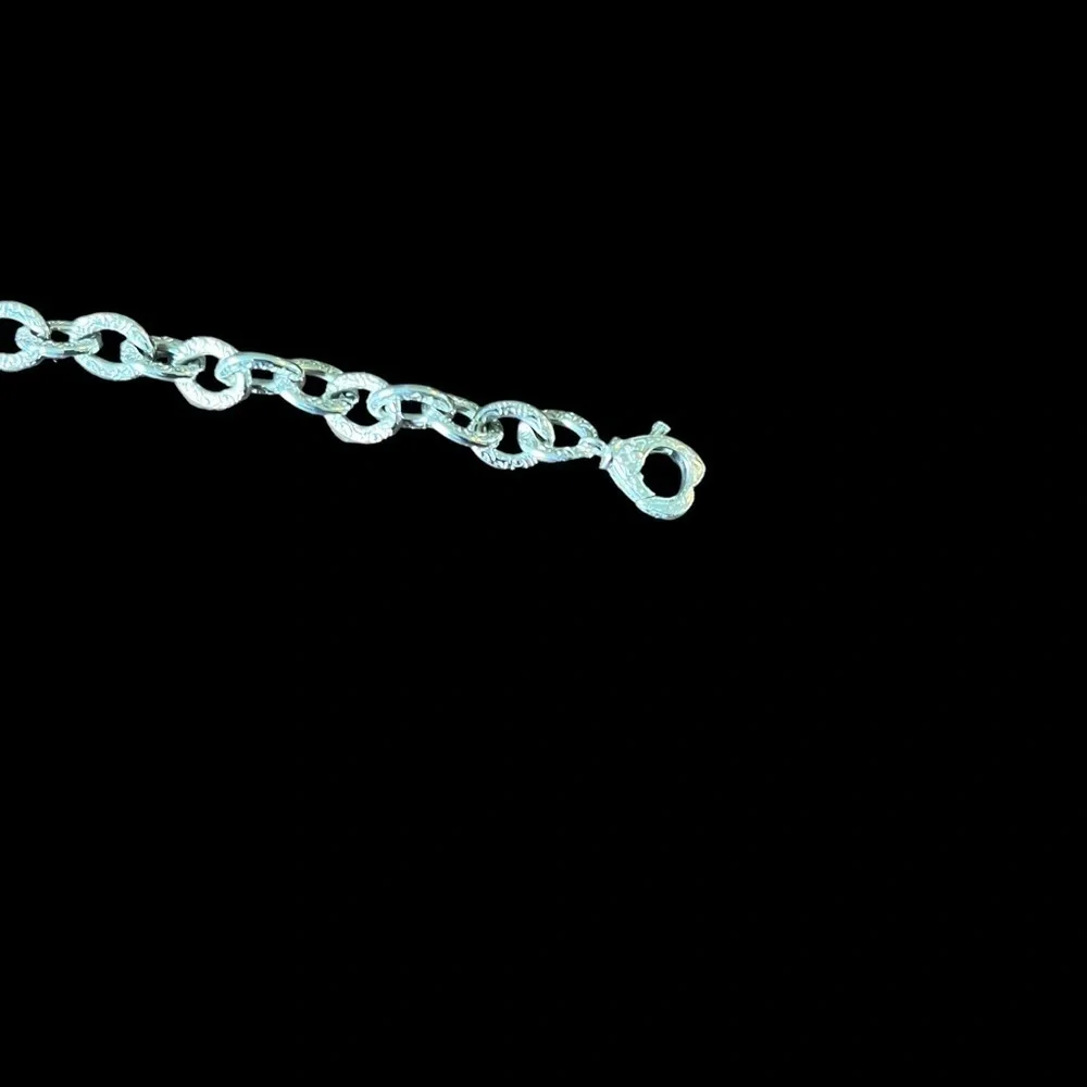 Woman’s Chain Bracelet With pavé Egg Pendant